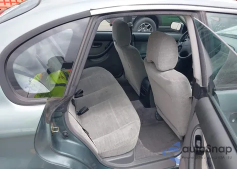 2001 Subaru Legacy L из США, поврежденный, VIN 4S3BE635717202203